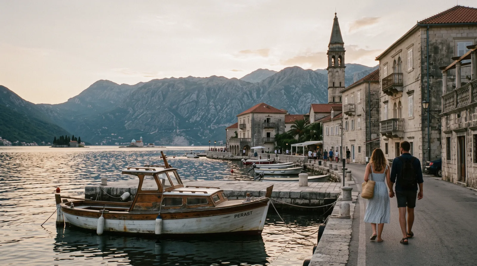 Boat crossing the Bay of Kotor toward Perast on a clear morning